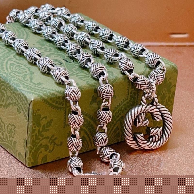 G*u*i necklaces